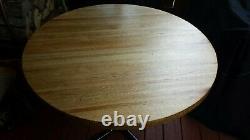 Dining round wood table-42 with oak butcher block top and iron pedestal