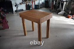 Freestanding butcher block tables handcrafted at the San Pedro art district
