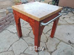 Oak butcherblock table with stainless steel handles