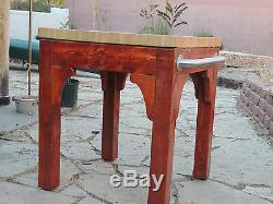 Oak butcherblock table with stainless steel handles